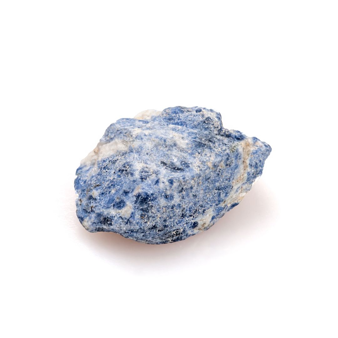 Sodalite, a blue and white stone on a white background.