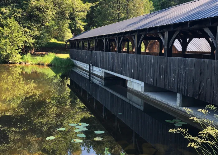 Covered Bridge overlooking the Mill Pond at O'Hara Mill Homestead and Conservation Area in Madoc, Ontario