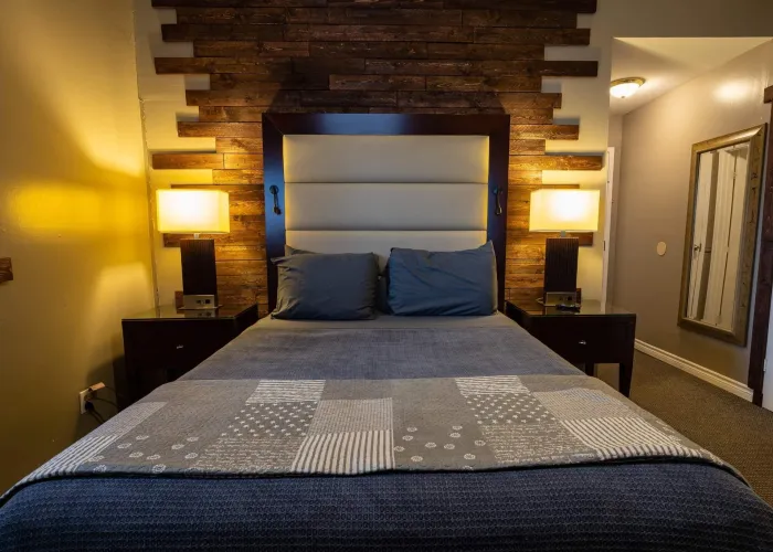 A bed in a hotel room