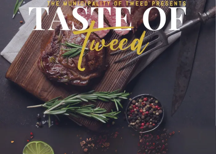 Taste of Tweed Poster. A steak on a cutting board with a black background and limes.