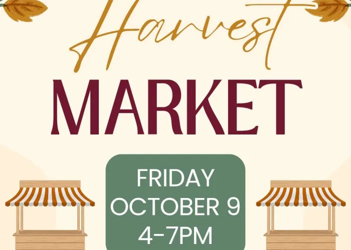 Beige Background, pumpkins along bottom of page, vine with leaves on top corners, two vendor stalls beside event details in centre of page